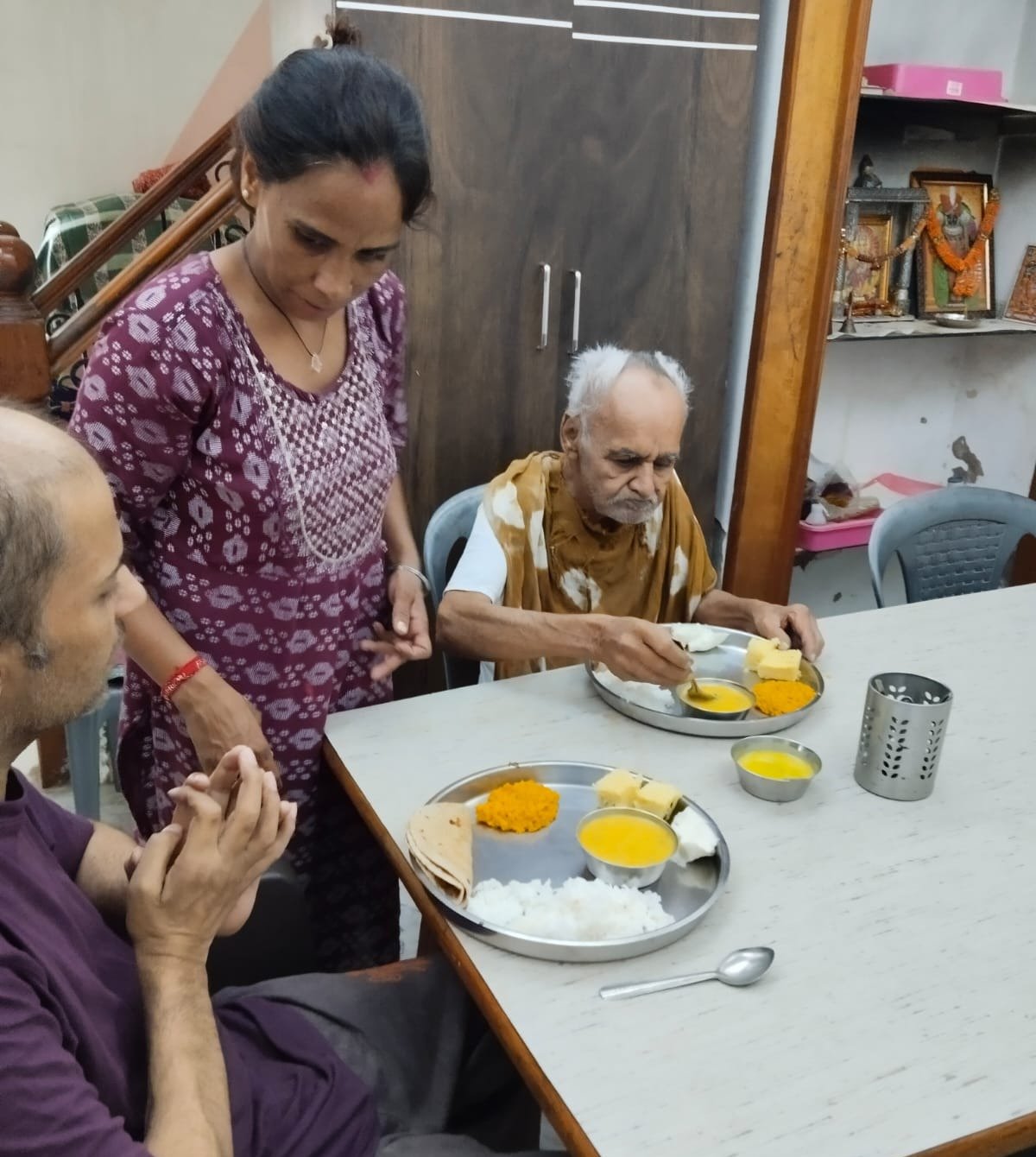 Residents sharing a meal together