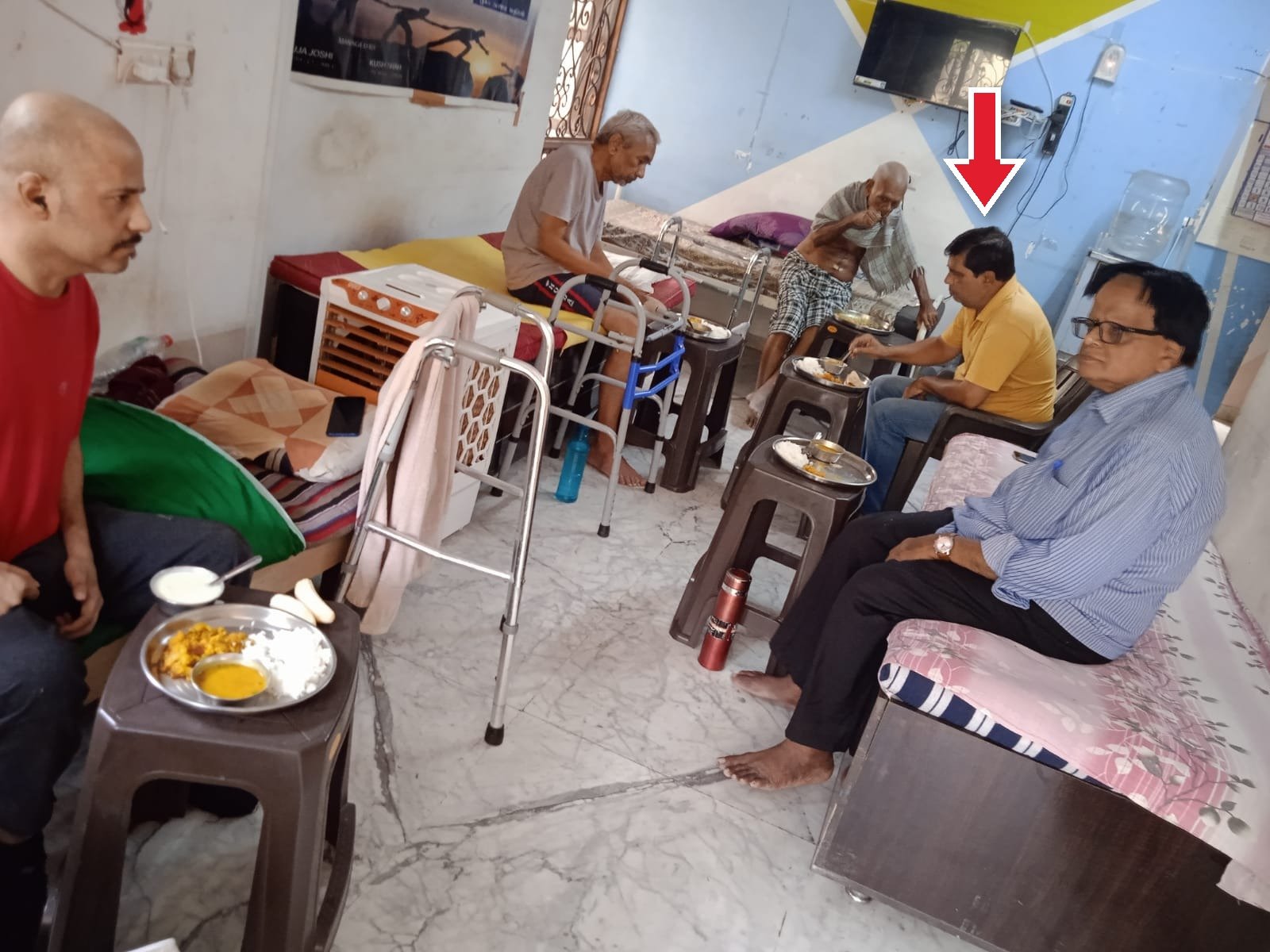 Mr. Yagnesh Joshi having a meal with the residents