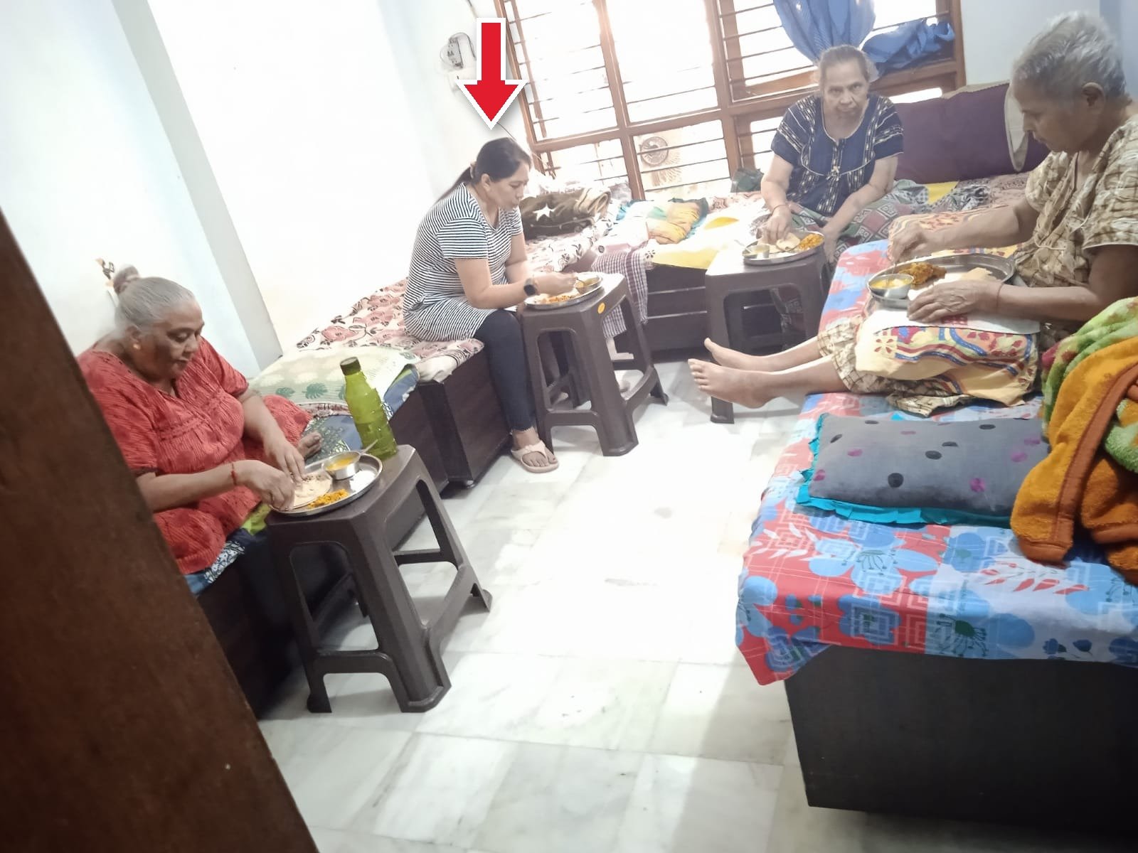 Mrs. Lajja Joshi with the residents