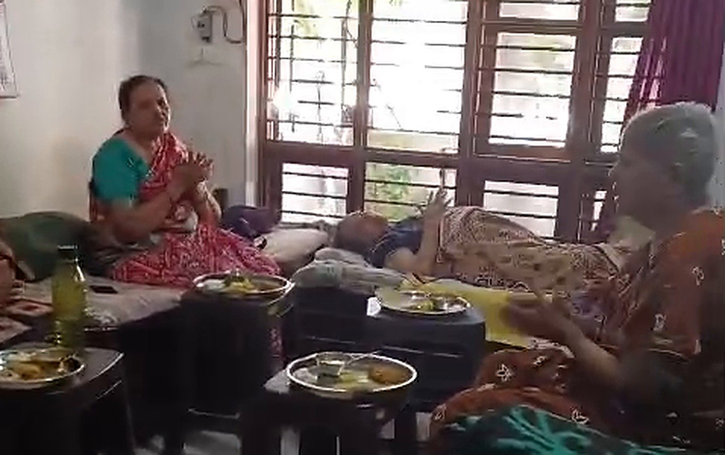 Elderly women having a meal together at Lakshya Foundation